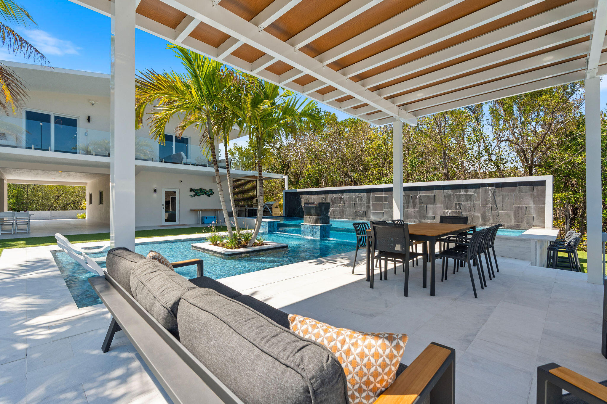 974 Shaw Drive Key Largo, FL 33037 - Photo 51 of 84 a view of a patio with dining table and chairs