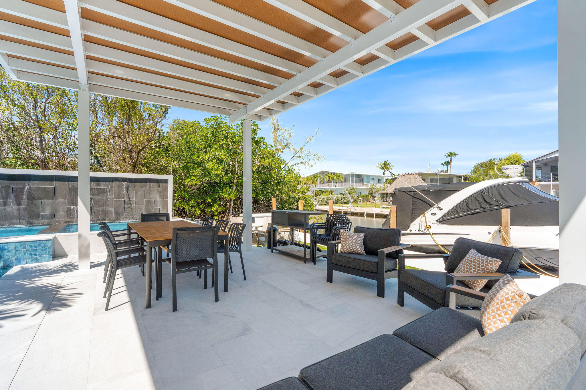 974 Shaw Drive Key Largo, FL 33037 - Photo 52 of 84 a view of a patio with couches and chairs