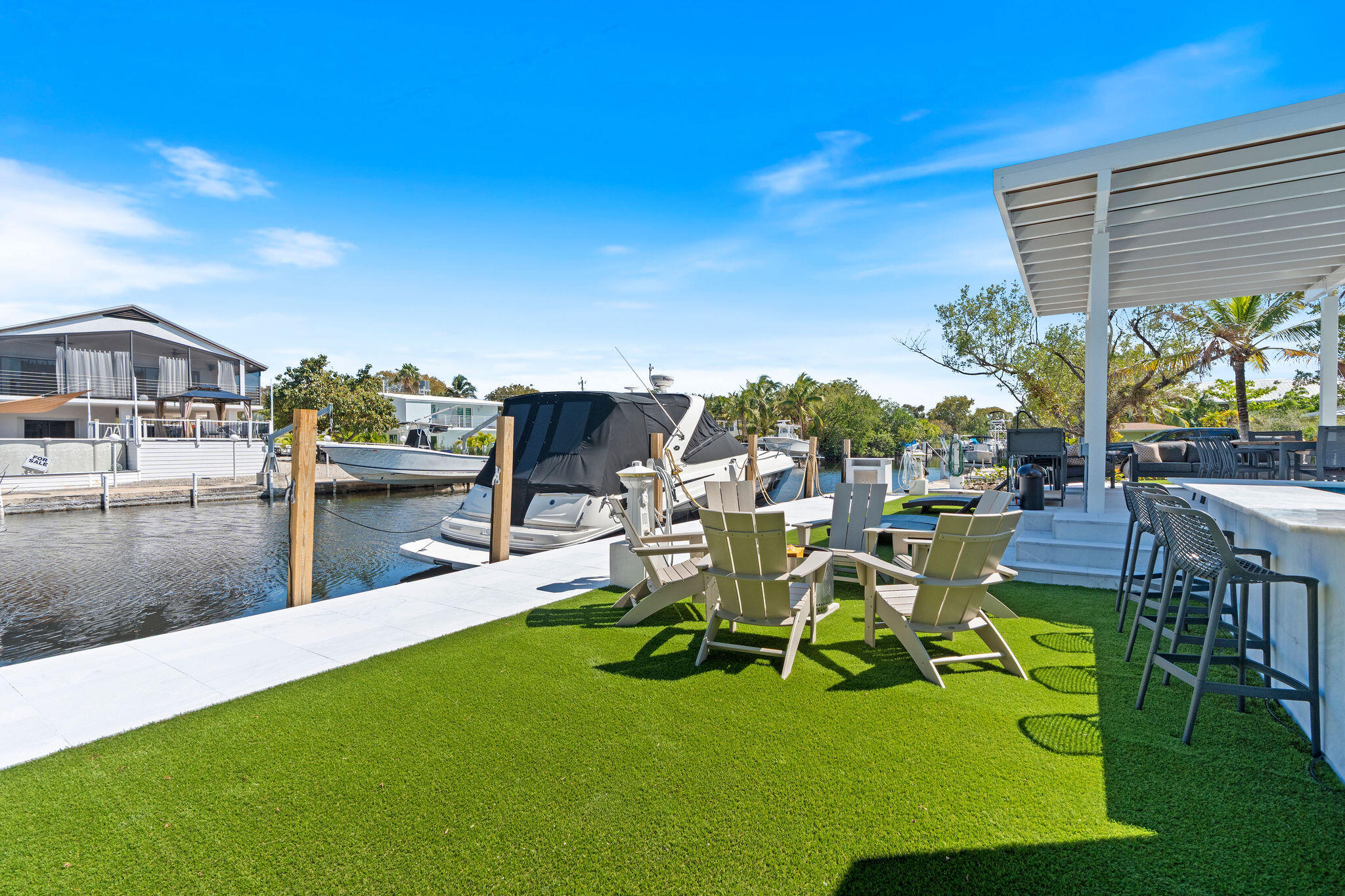 974 Shaw Drive Key Largo, FL 33037 - Photo 59 of 84 a view of a chairs and table in patio