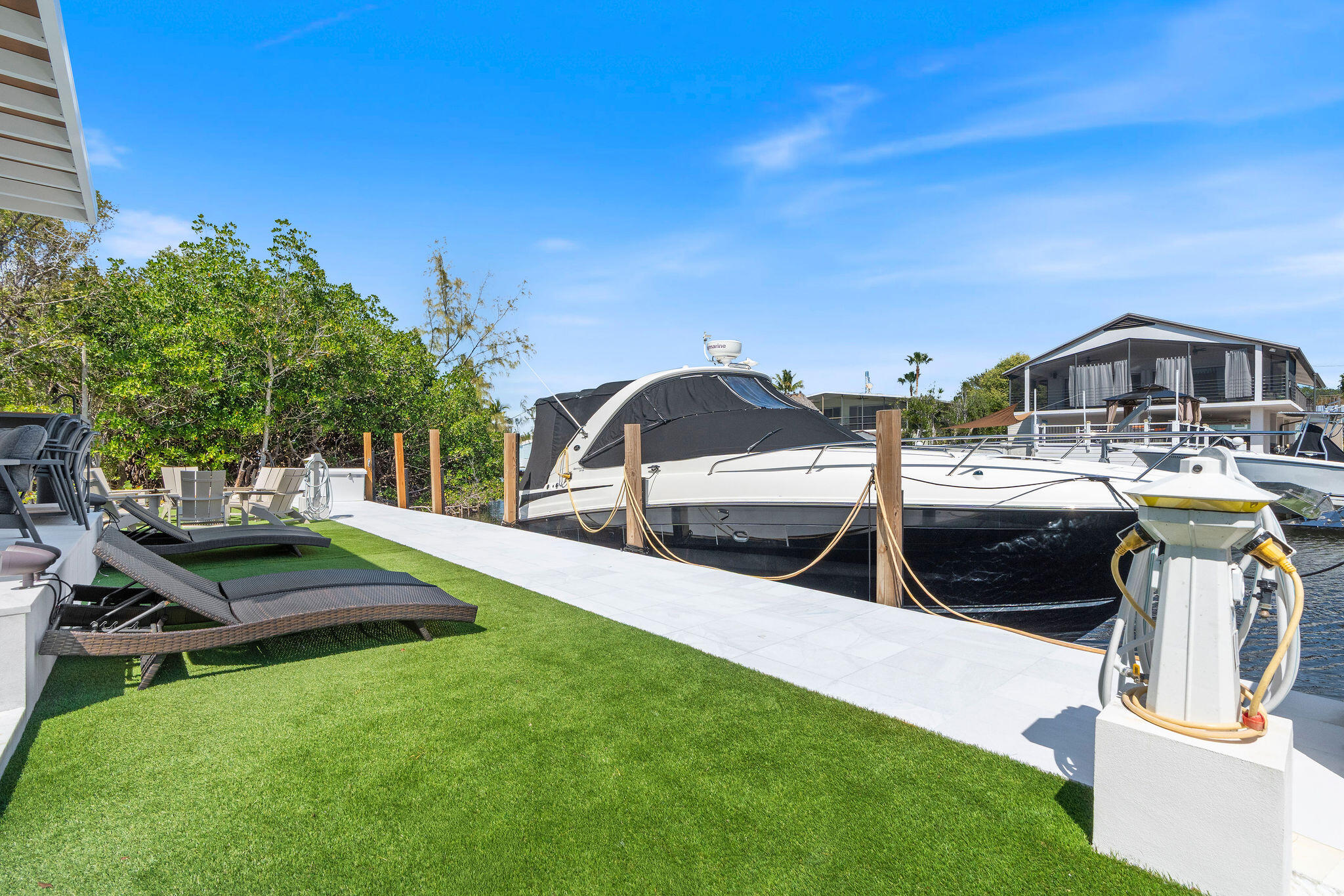 974 Shaw Drive Key Largo, FL 33037 - Photo 61 of 84 a view of a backyard with sitting area