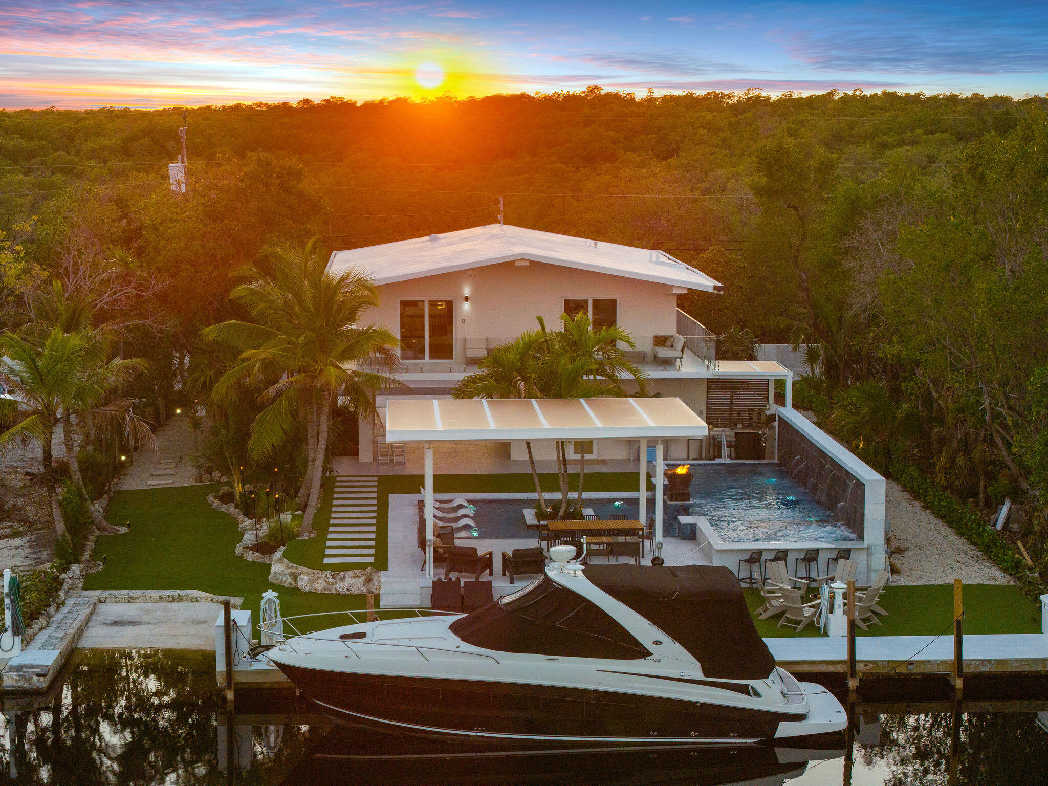 974 Shaw Drive Key Largo, FL 33037 - Photo 66 of 84 a view of a house with a yard