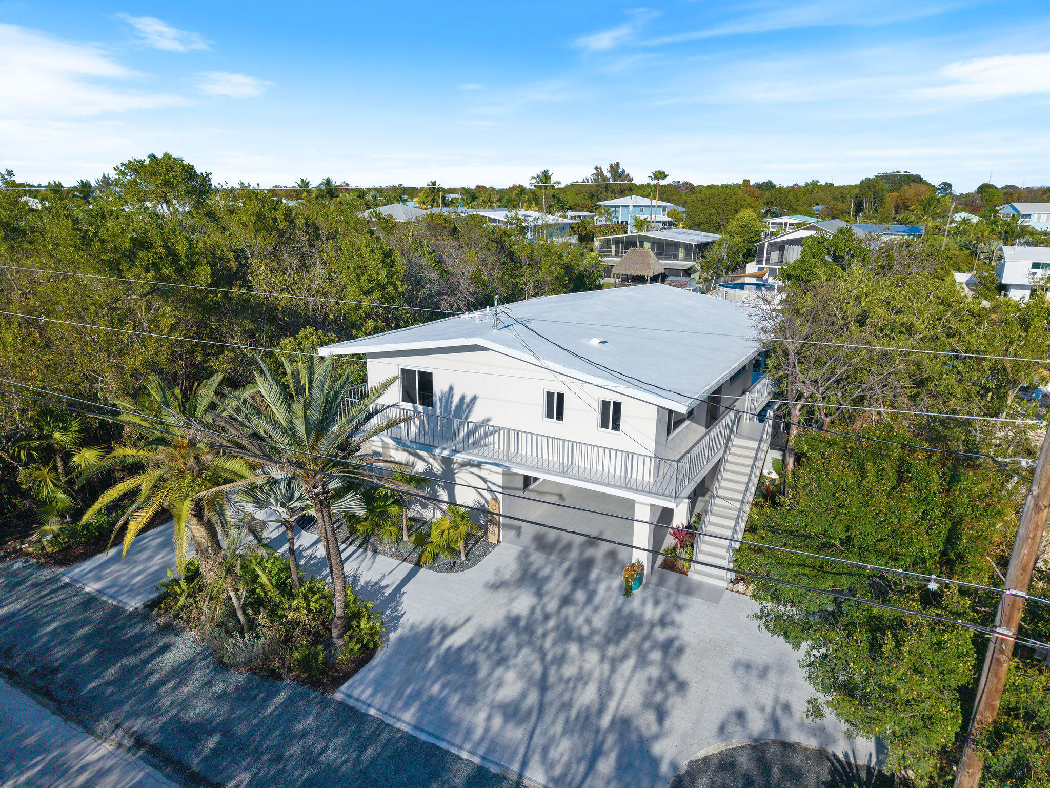 974 Shaw Drive Key Largo, FL 33037 - Photo 69 of 84 an aerial view of a house