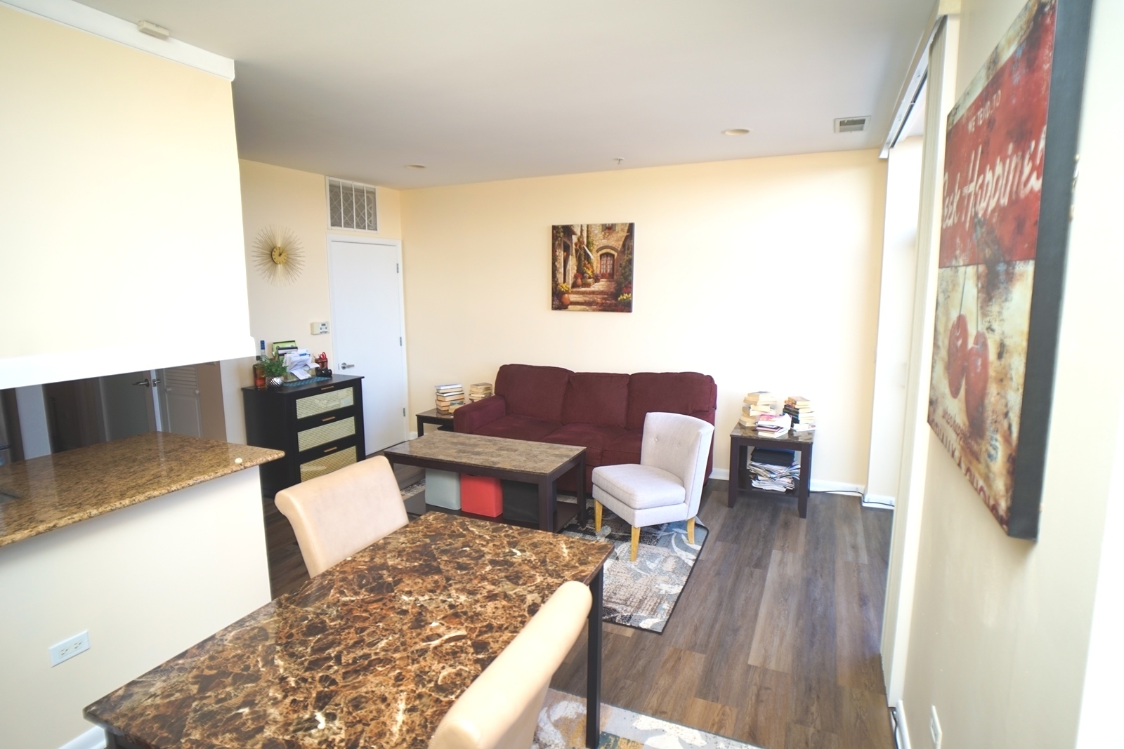 1222 Chicago Avenue, Unit 705 Evanston, IL 60202 - Photo 6 of 33 a living room with furniture and a fireplace