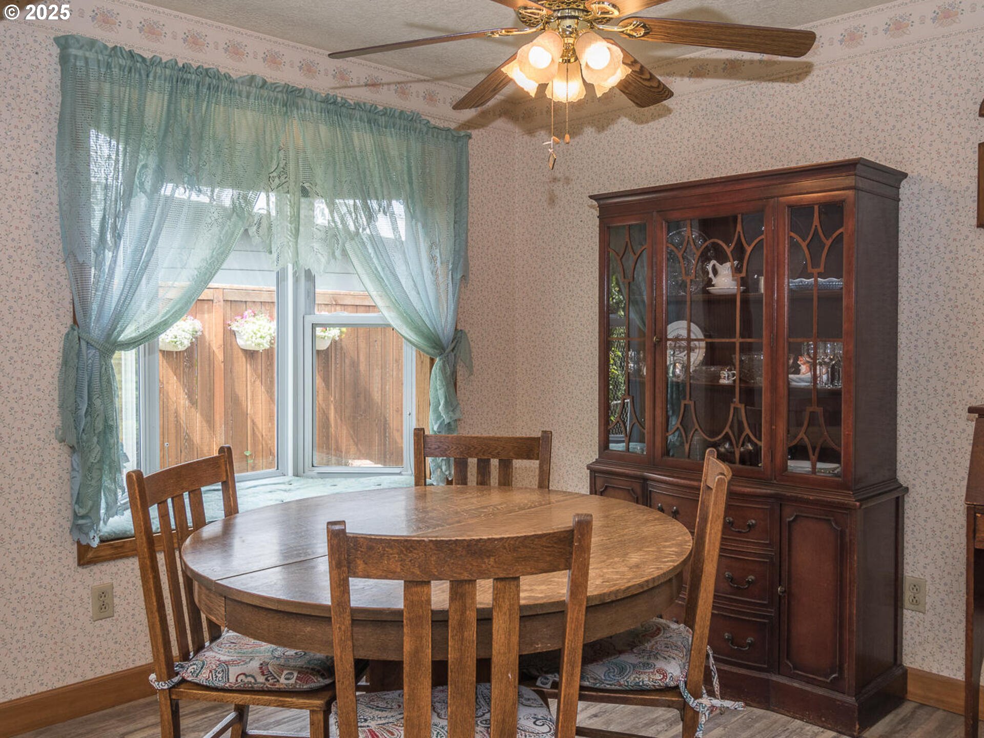 19838 Northeast Wasco Street Portland, OR 97230 - Photo 12 of 42 a view of a dining room with furniture window and outside view