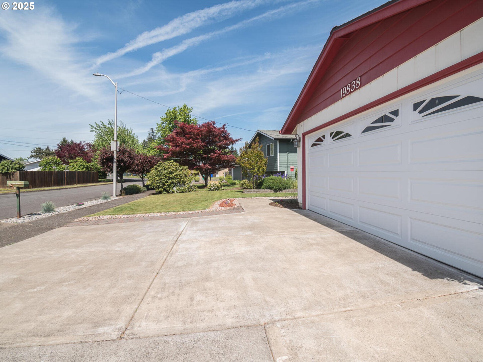 19838 Northeast Wasco Street Portland, OR 97230 - Photo 2 of 42 a view of backyard with plants and outdoor seating