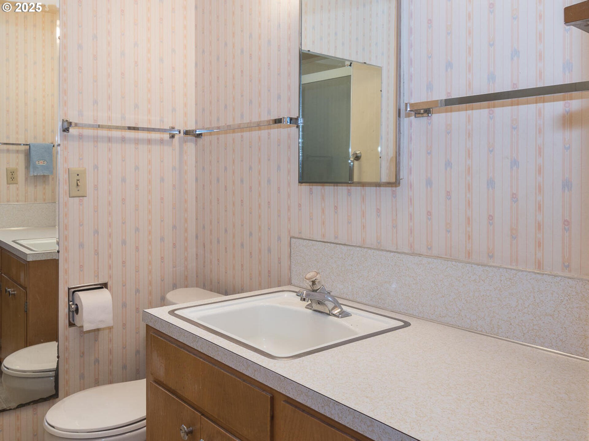 19838 Northeast Wasco Street Portland, OR 97230 - Photo 23 of 42 a bathroom with a sink a toilet and shower
