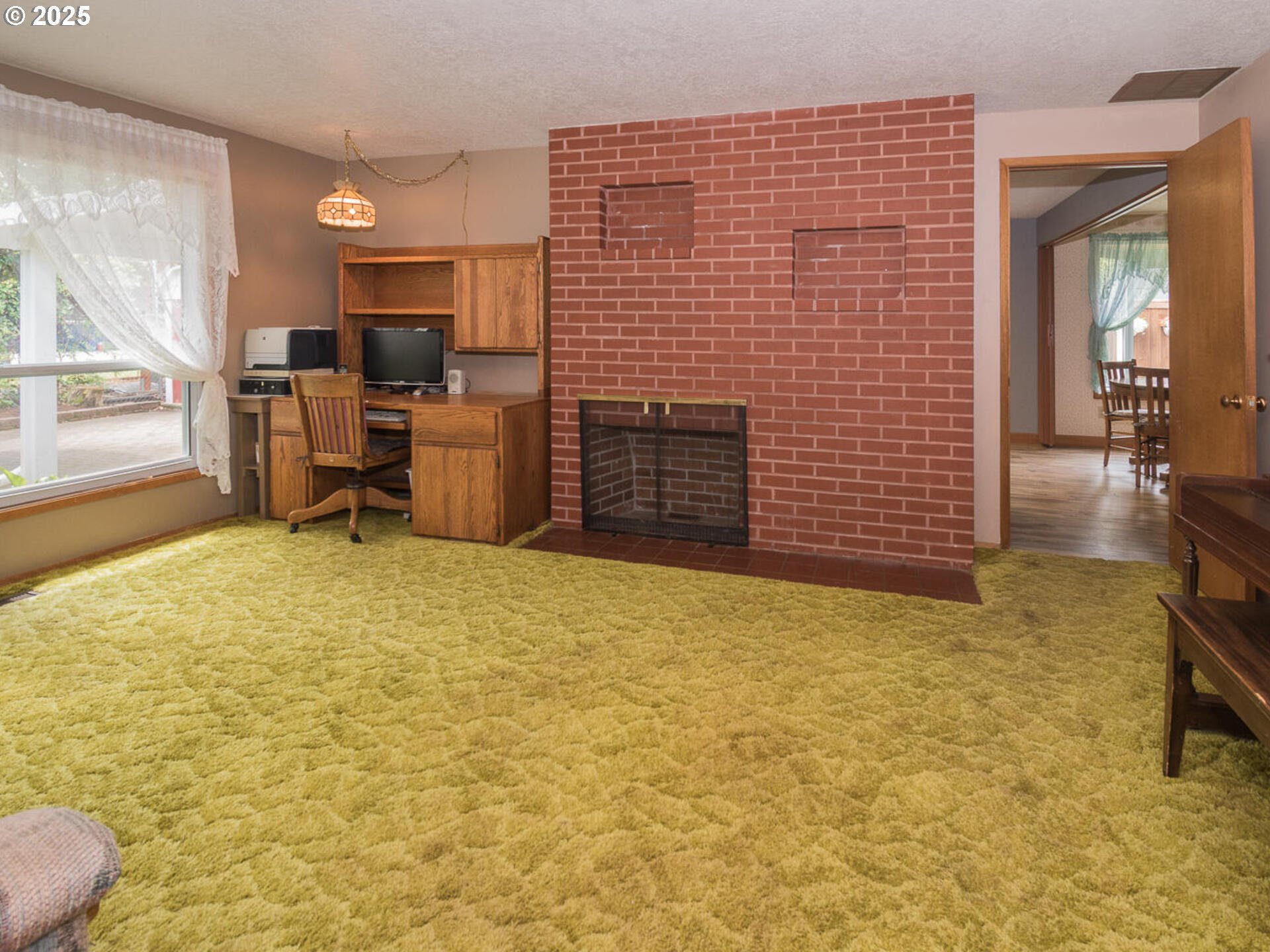 19838 Northeast Wasco Street Portland, OR 97230 - Photo 31 of 42 a view of a livingroom with furniture and an empty room
