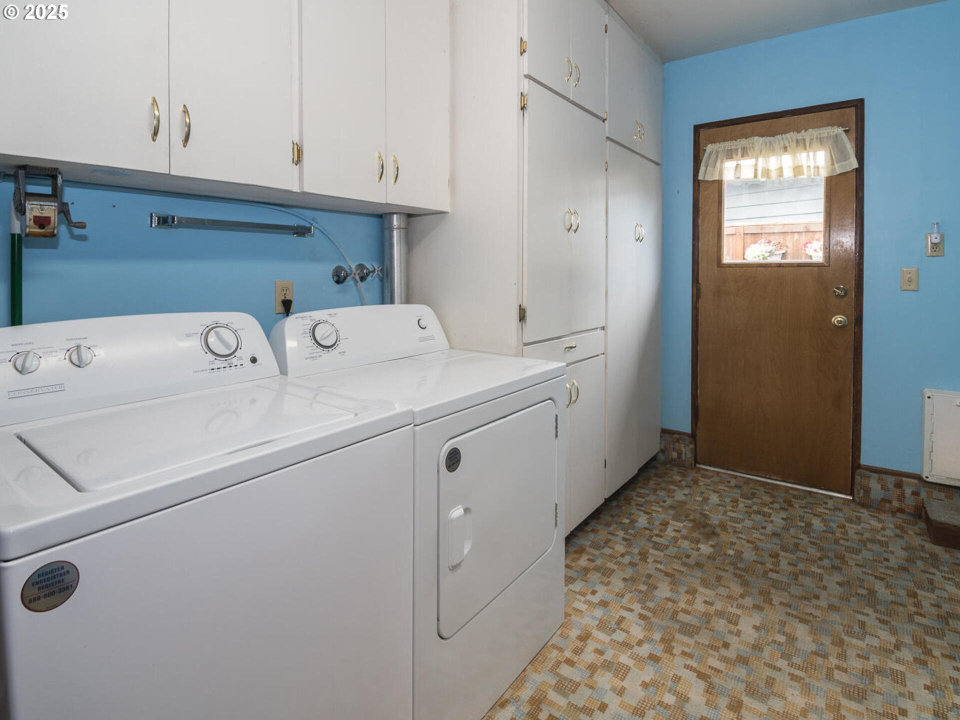 19838 Northeast Wasco Street Portland, OR 97230 - Photo 35 of 42 a utility room with dryer and washer