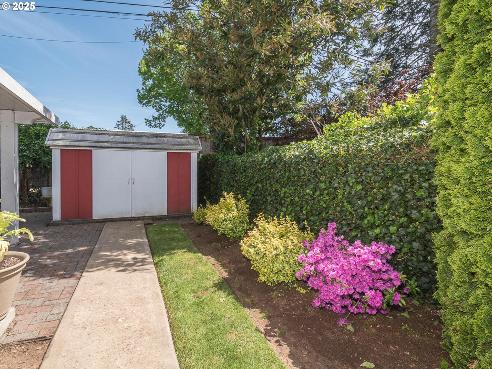19838 Northeast Wasco Street Portland, OR 97230 - Photo 38 of 42 a front view of a house with a yard