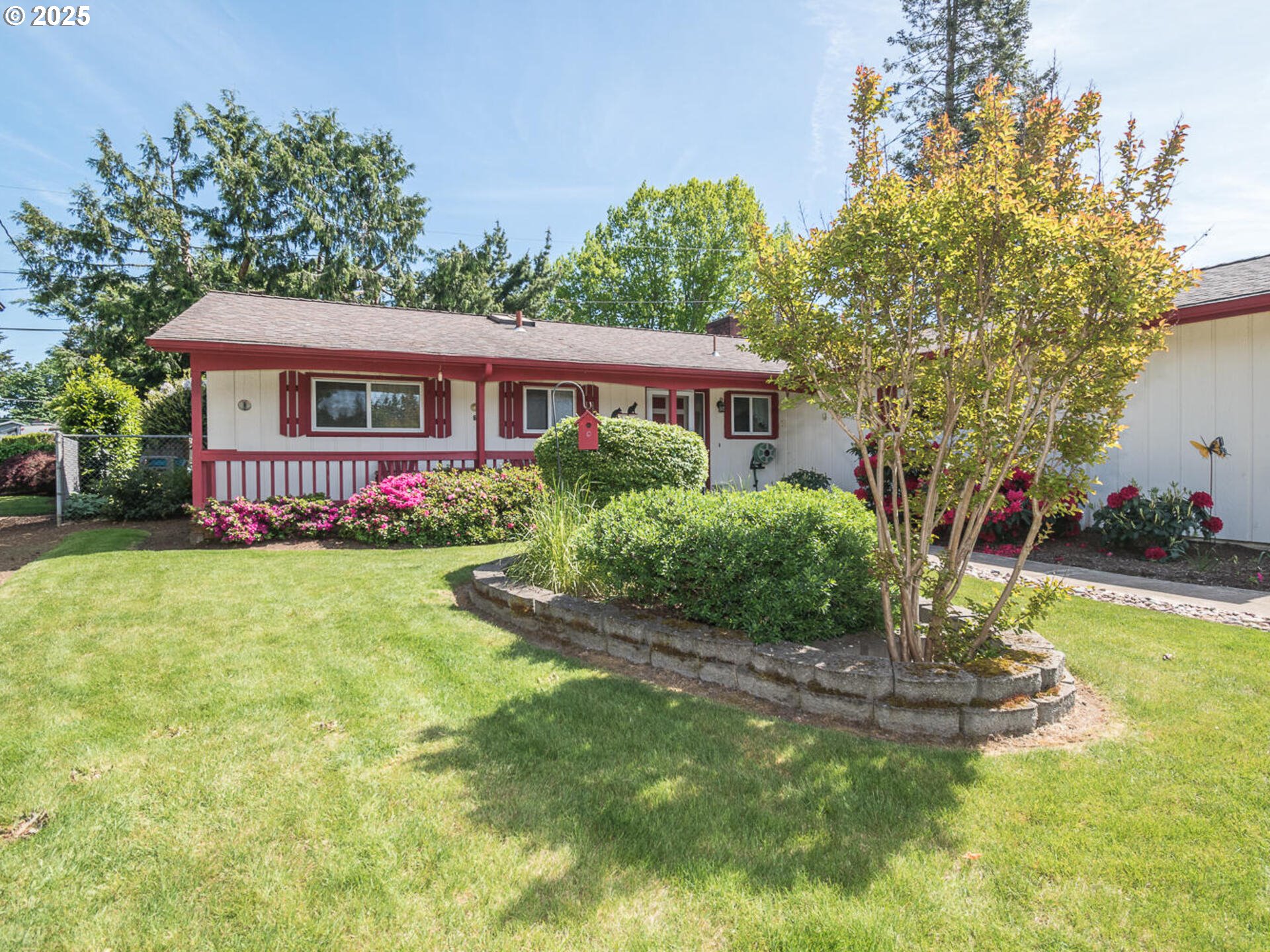19838 Northeast Wasco Street Portland, OR 97230 - Photo 5 of 42 a front view of a house with garden
