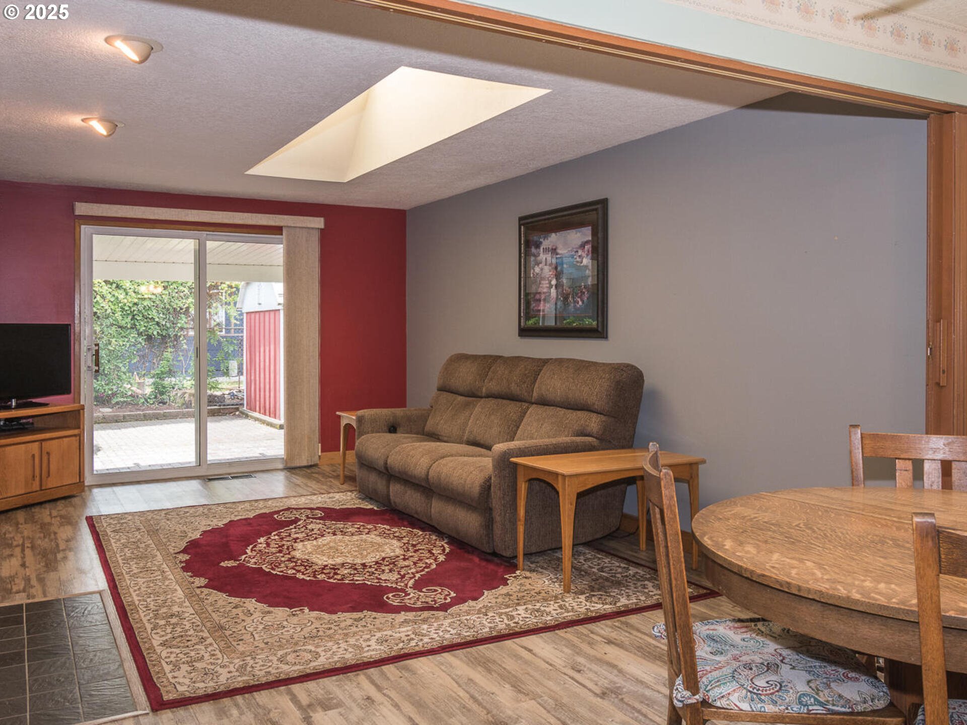19838 Northeast Wasco Street Portland, OR 97230 - Photo 9 of 42 a living room with a couch and a rug