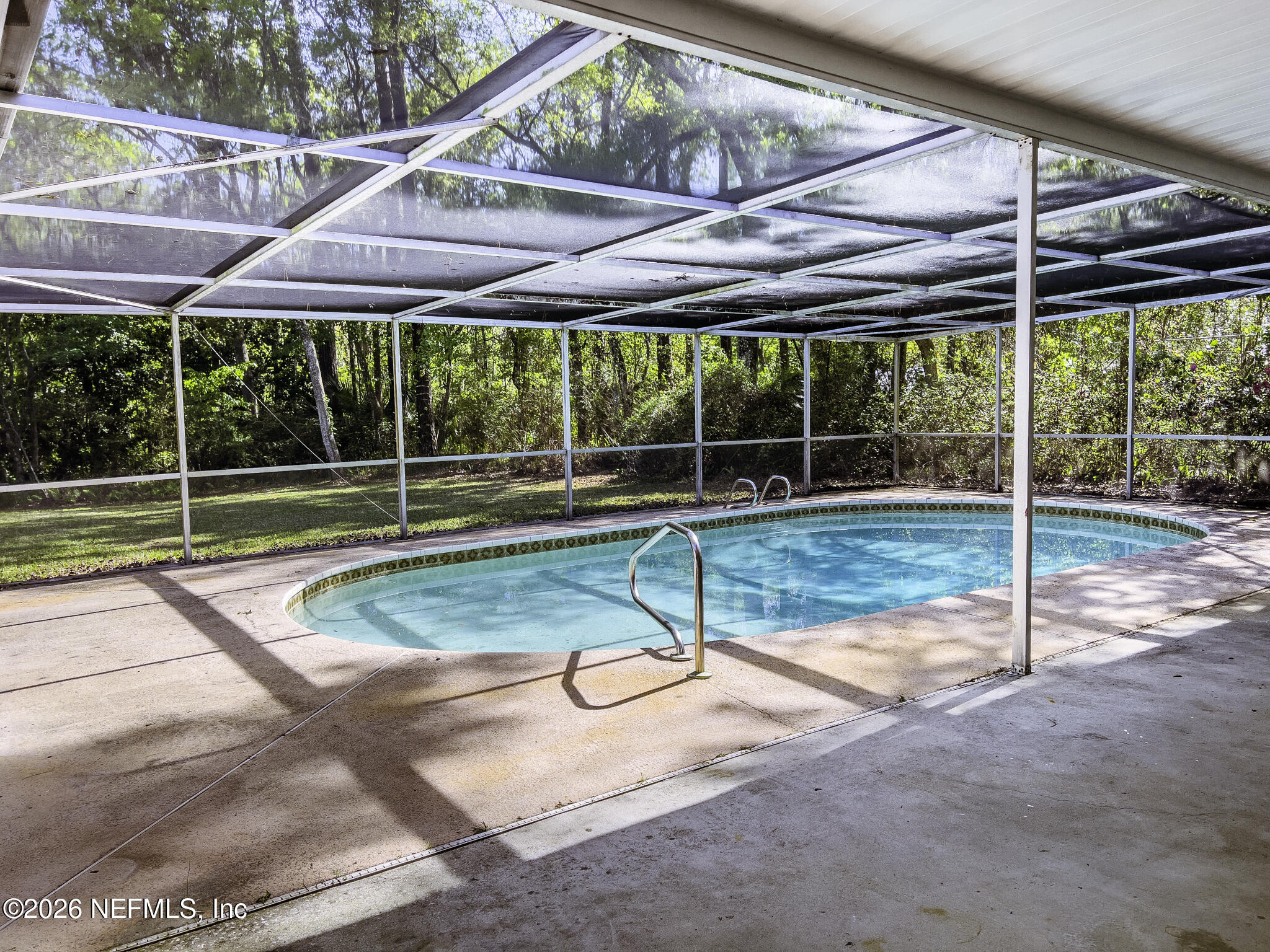 2085 Mills Road Jacksonville, FL 32216 - Photo 9 of 13 a view of a room with porch and a backyard