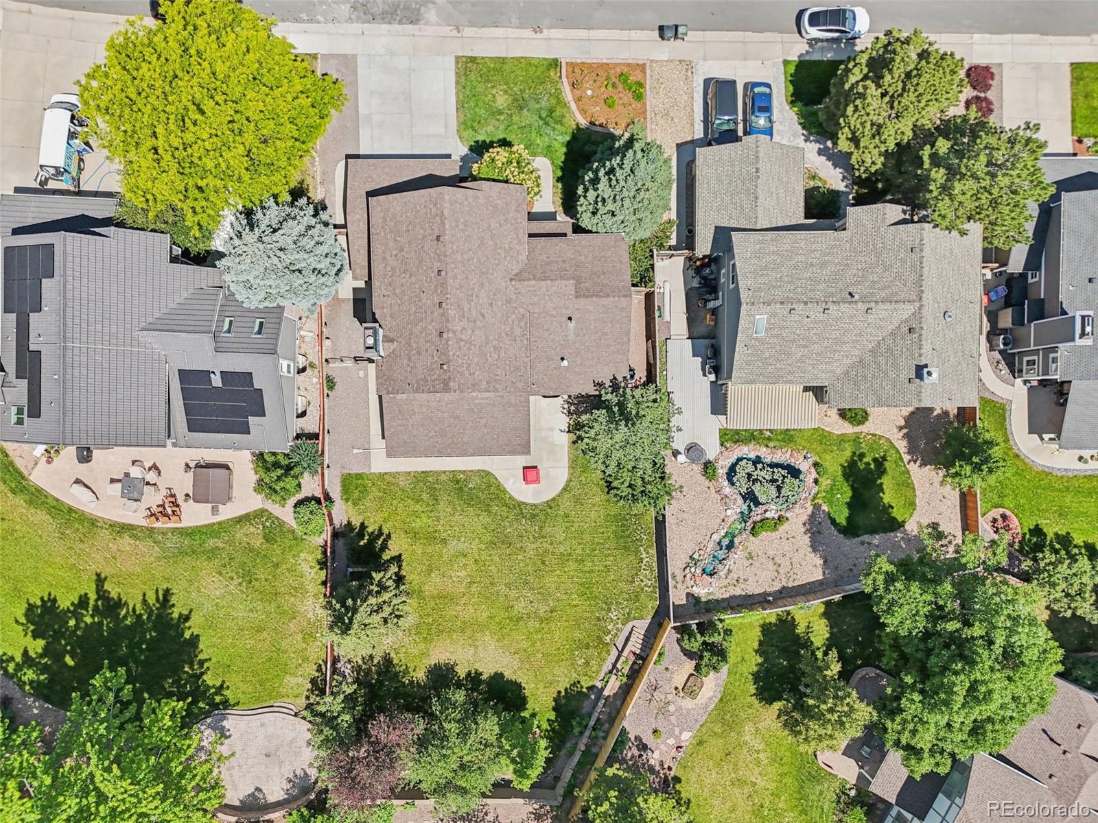 9810 Venneford Ranch Road Highlands Ranch, CO 80126 - Photo 43 of 50 an aerial view of a house with outdoor space
