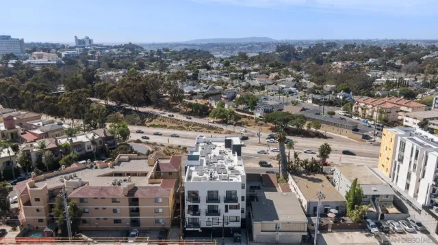 an aerial view of a city with lots of residential buildings