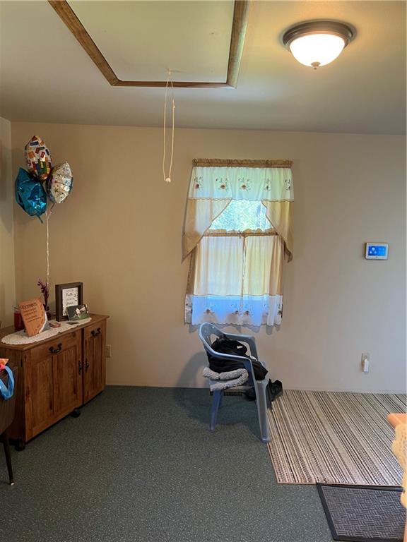 42686 Gilson Ridge Road Titusville, PA 16354 - Photo 15 of 19 a bed room with a bed and a table