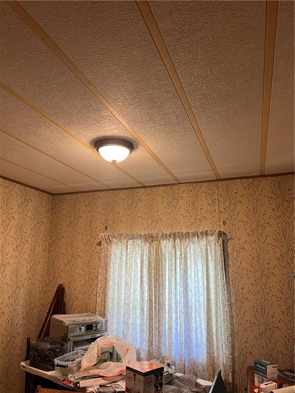 42686 Gilson Ridge Road Titusville, PA 16354 - Photo 16 of 19 a view of a room with a couch and a window