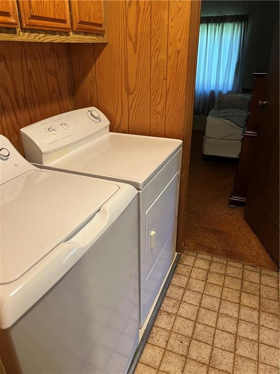 42686 Gilson Ridge Road Titusville, PA 16354 - Photo 19 of 19 a utility room with dryer and washer