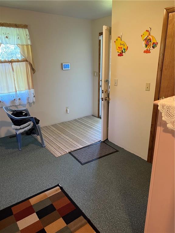 42686 Gilson Ridge Road Titusville, PA 16354 - Photo 8 of 19 a view of an empty room and a window