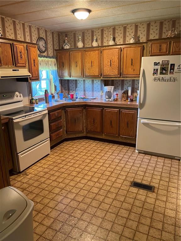 42686 Gilson Ridge Road Titusville, PA 16354 - Photo 9 of 19 a kitchen with a sink and cabinets