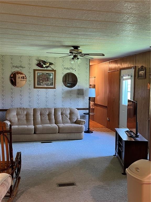 42686 Gilson Ridge Road Titusville, PA 16354 - Photo 10 of 19 a living room with furniture and a flat screen tv