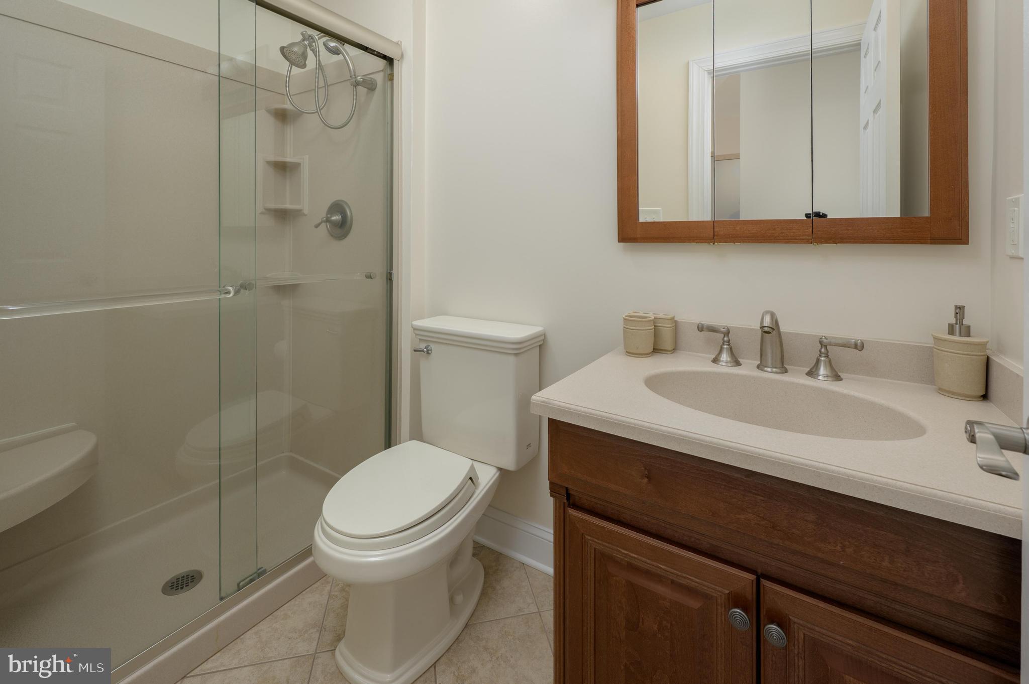 82 Boothby Drive Mount Laurel, NJ 08054 - Photo 14 of 20 a bathroom with a sink toilet and shower
