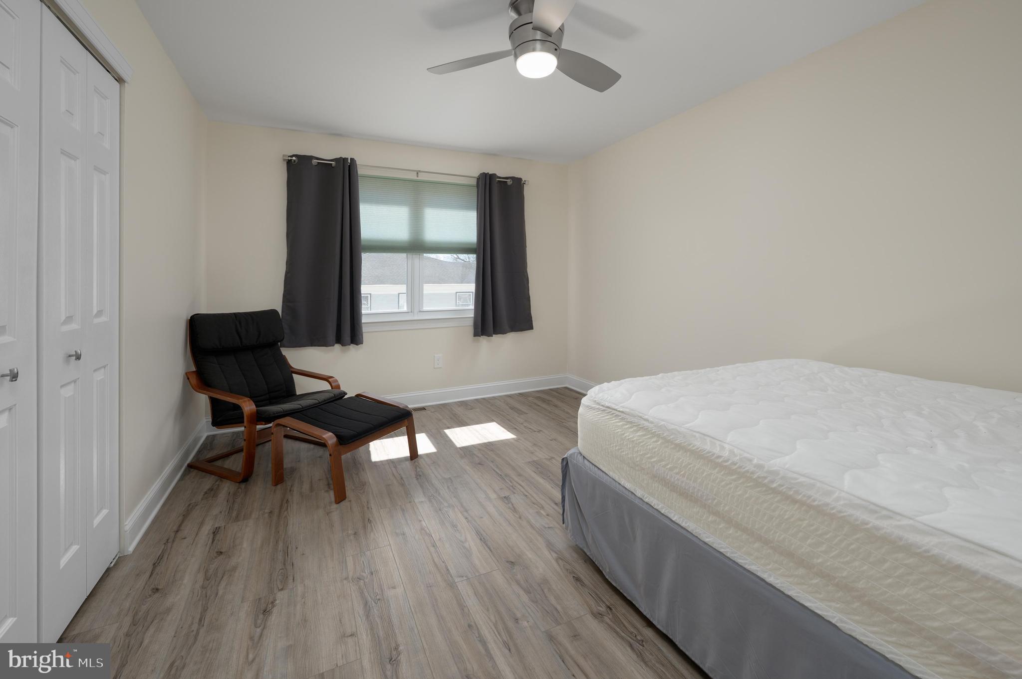 82 Boothby Drive Mount Laurel, NJ 08054 - Photo 16 of 20 a room with a bed and a chair