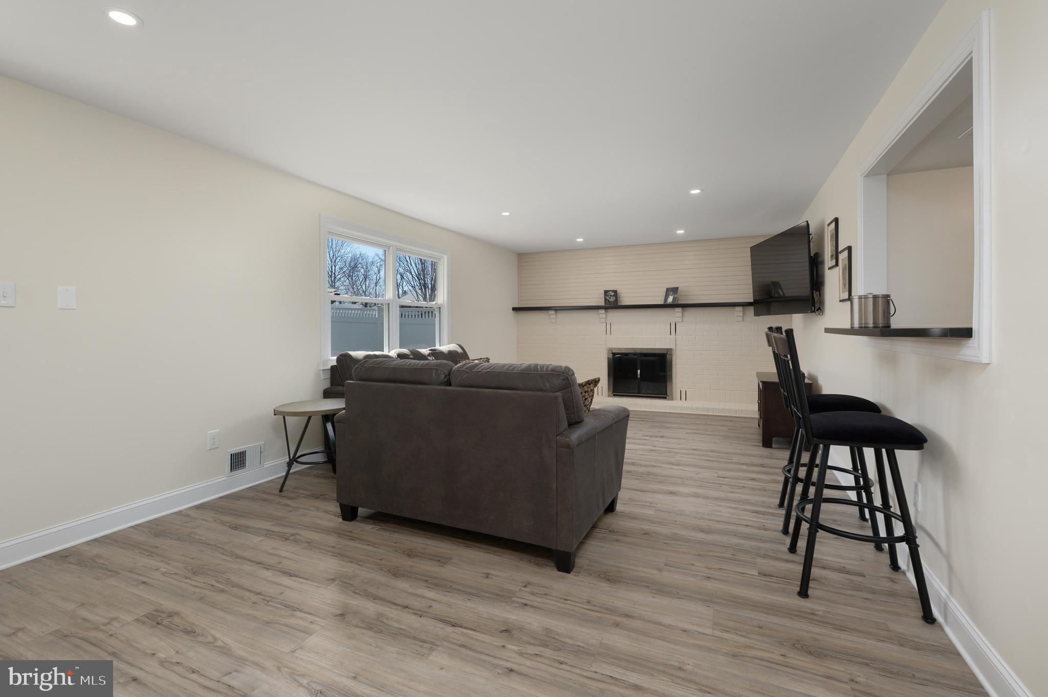 82 Boothby Drive Mount Laurel, NJ 08054 - Photo 9 of 20 a living room with furniture and a wooden floor