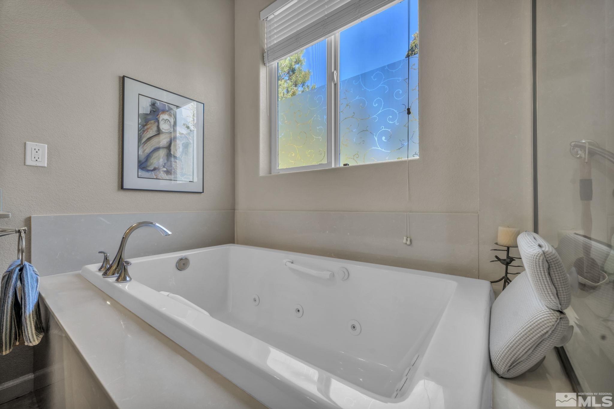 1479 Snow Summit Drive Reno, NV 89523 - Photo 17 of 40 a bathroom with a bathtub