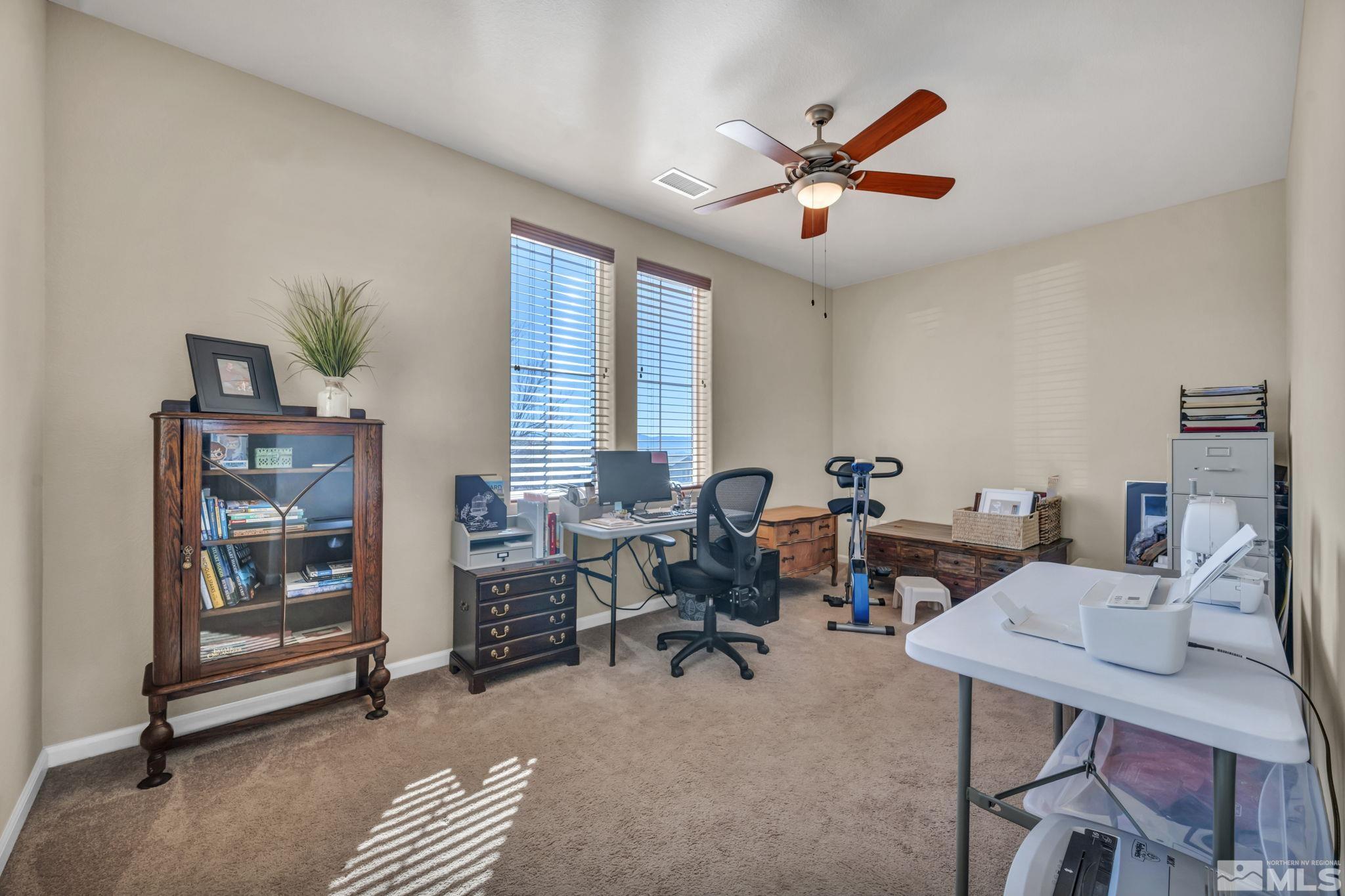 1479 Snow Summit Drive Reno, NV 89523 - Photo 24 of 40 a workspace with furniture and window