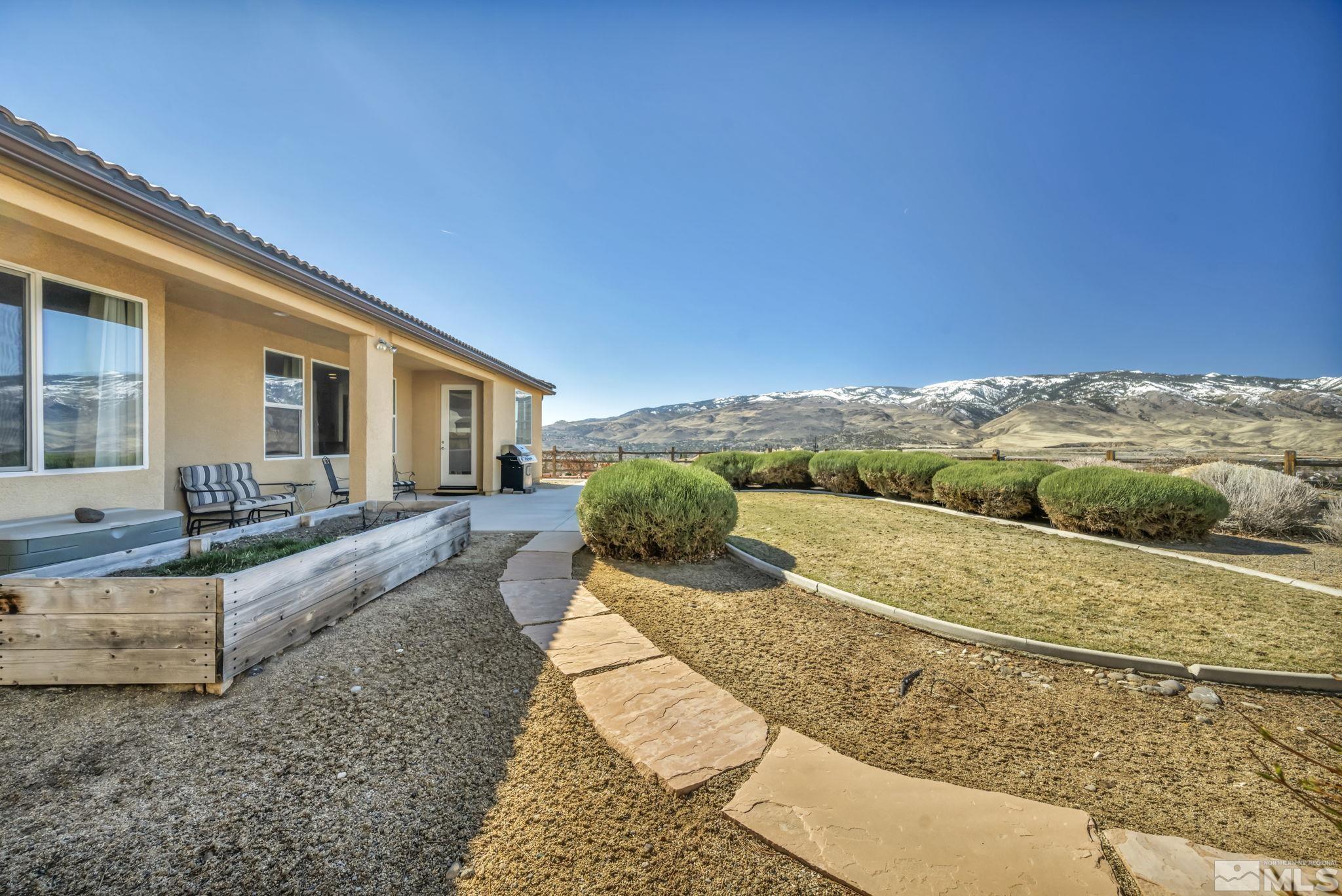 1479 Snow Summit Drive Reno, NV 89523 - Photo 29 of 40 a view of a house with a yard