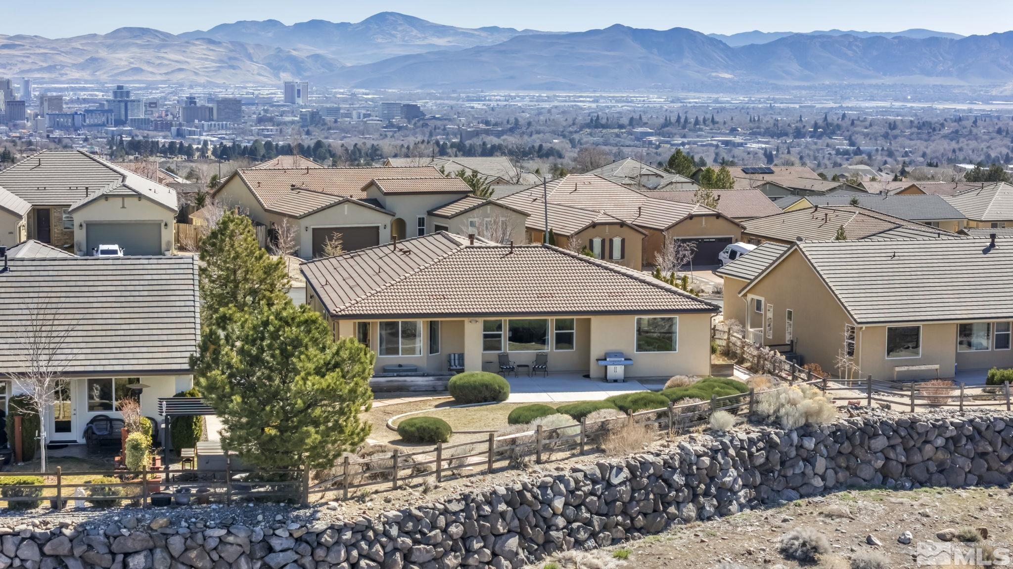 1479 Snow Summit Drive Reno, NV 89523 - Photo 36 of 40 a aerial view of a house with a mountain
