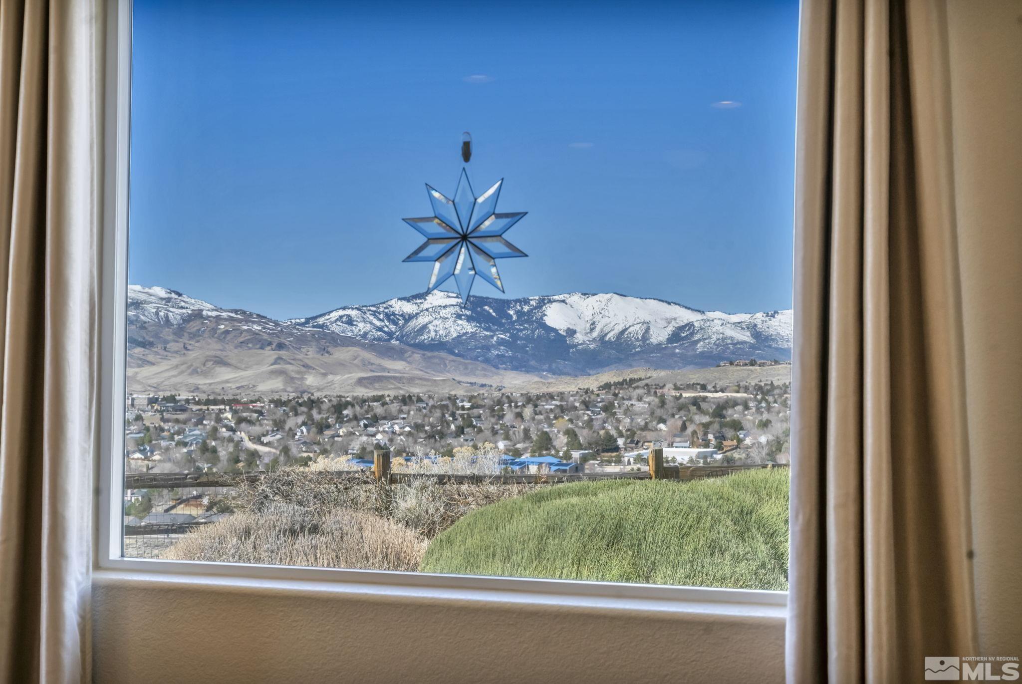 1479 Snow Summit Drive Reno, NV 89523 - Photo 7 of 40 a view of a lake from a window