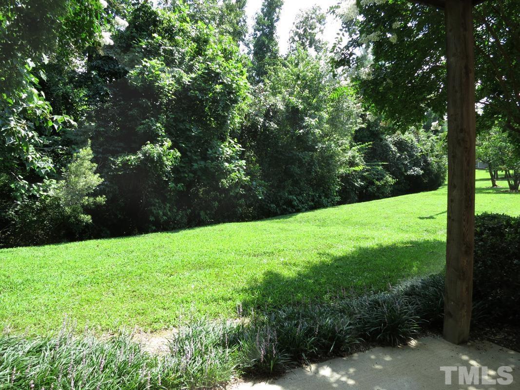 303 Smith Level Road, Unit F11 Chapel Hill, NC 27516 - Photo 12 of 14 a view of a trees with a yard