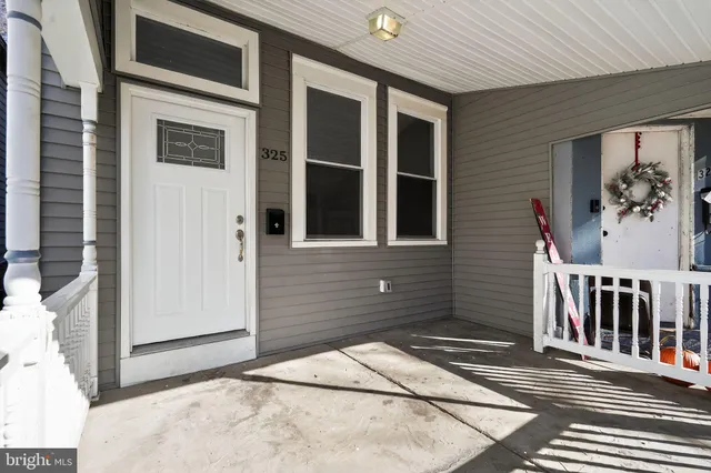 a view of a brick house with a door