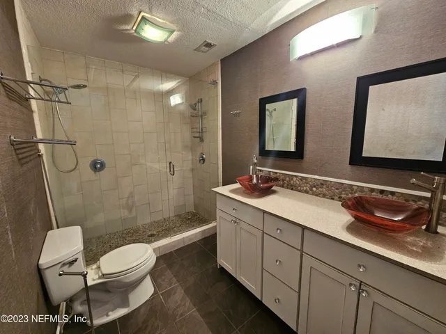 a view of a hallway with washer and dryer