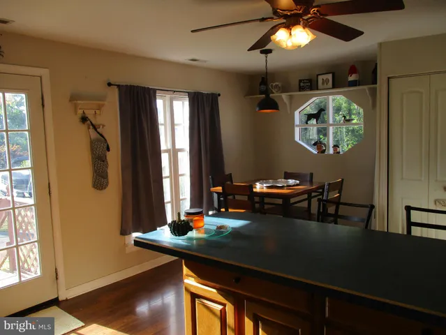 a room with a table and chairs