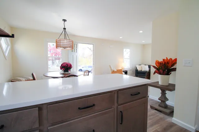 a kitchen with a stove and a sink