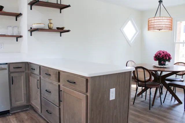 a en suite bathroom with a sink and a mirror