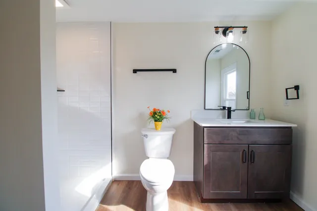 a view of balcony with wooden floor