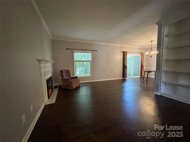 a view of livingroom with furniture and hardwood floor