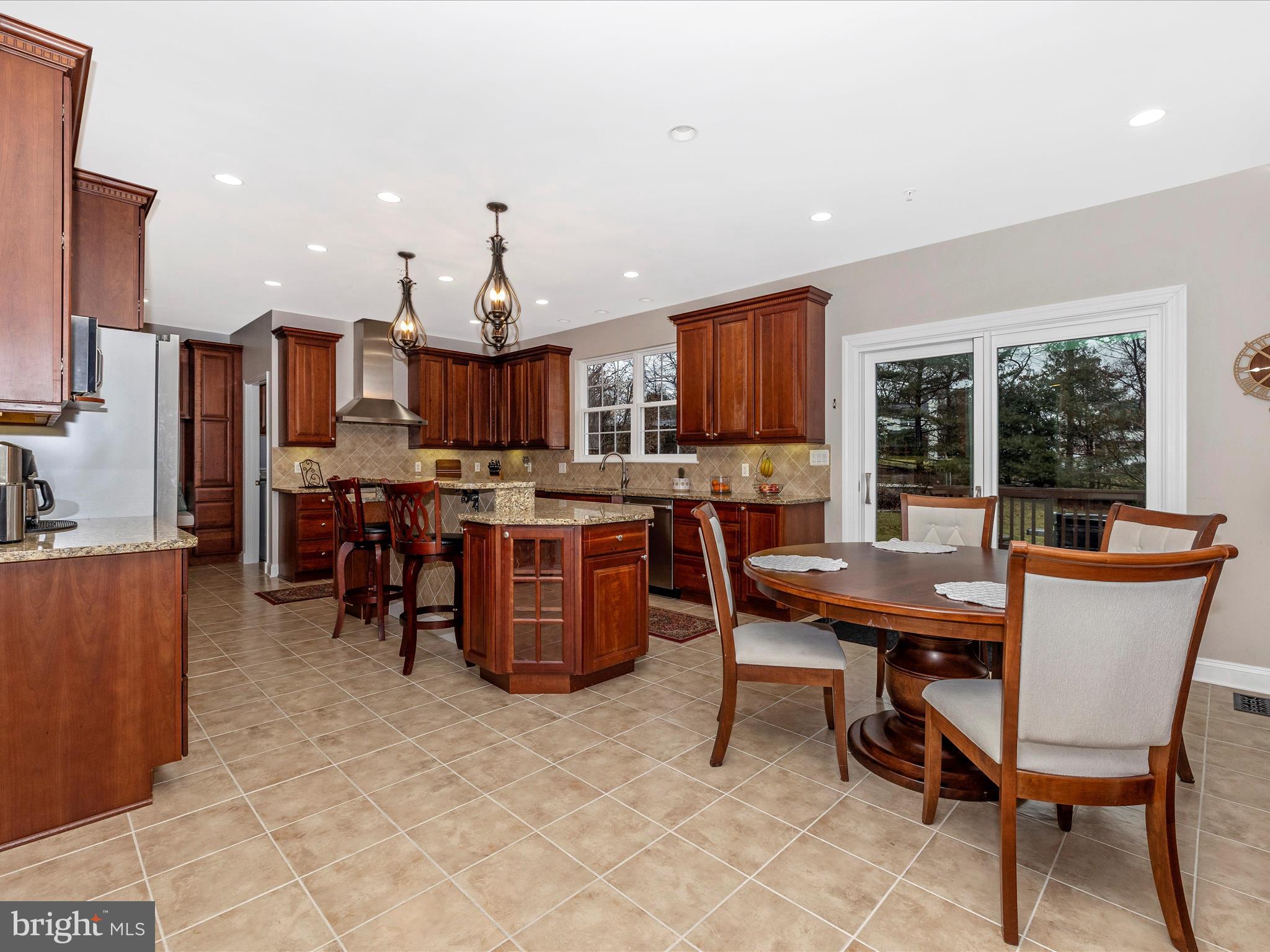 352 Ridge Road Washington Grove, MD 20880 - Photo 11 of 58 a view of a dining room with furniture