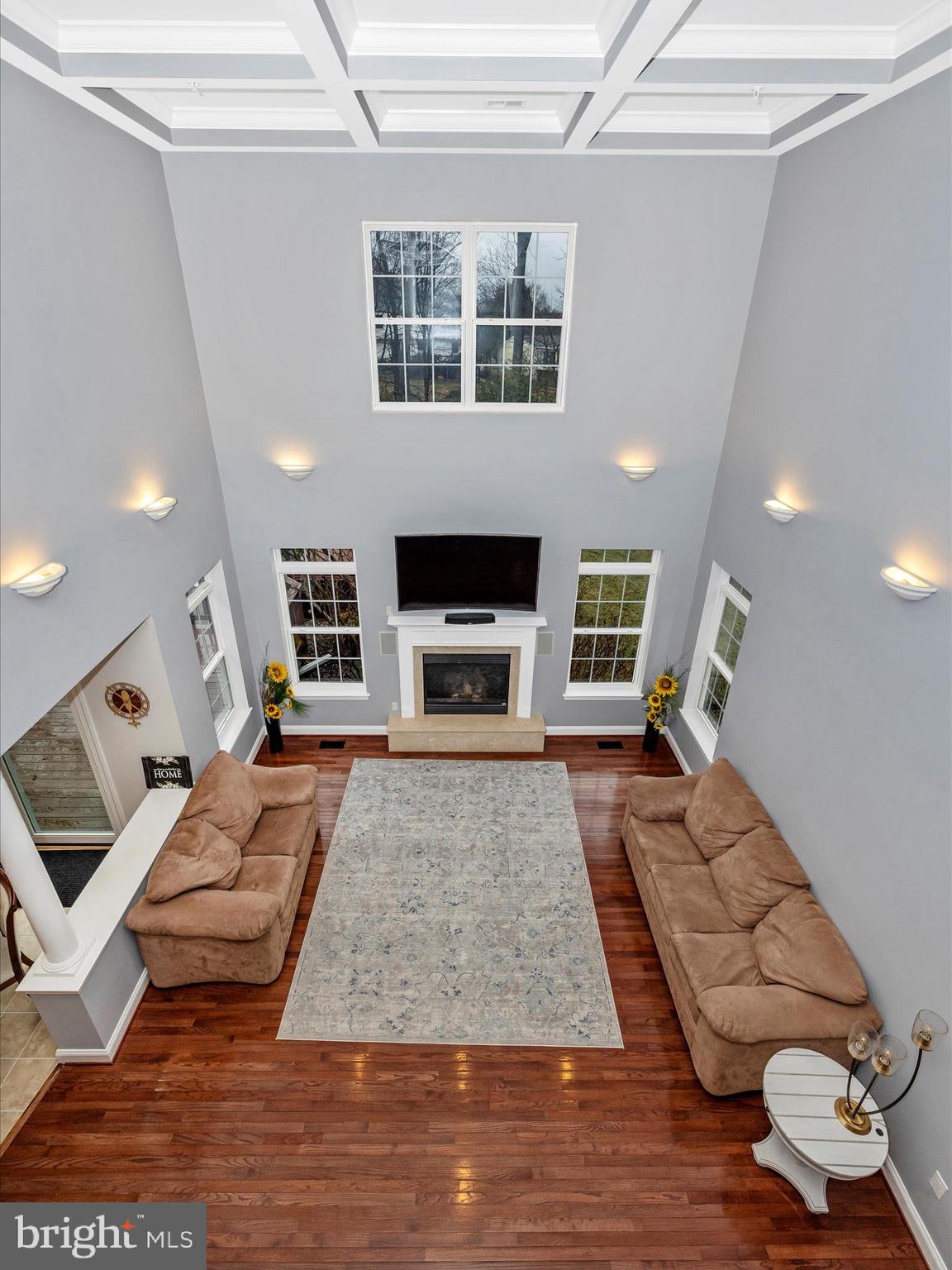 352 Ridge Road Washington Grove, MD 20880 - Photo 20 of 58 a living room with furniture and a fireplace