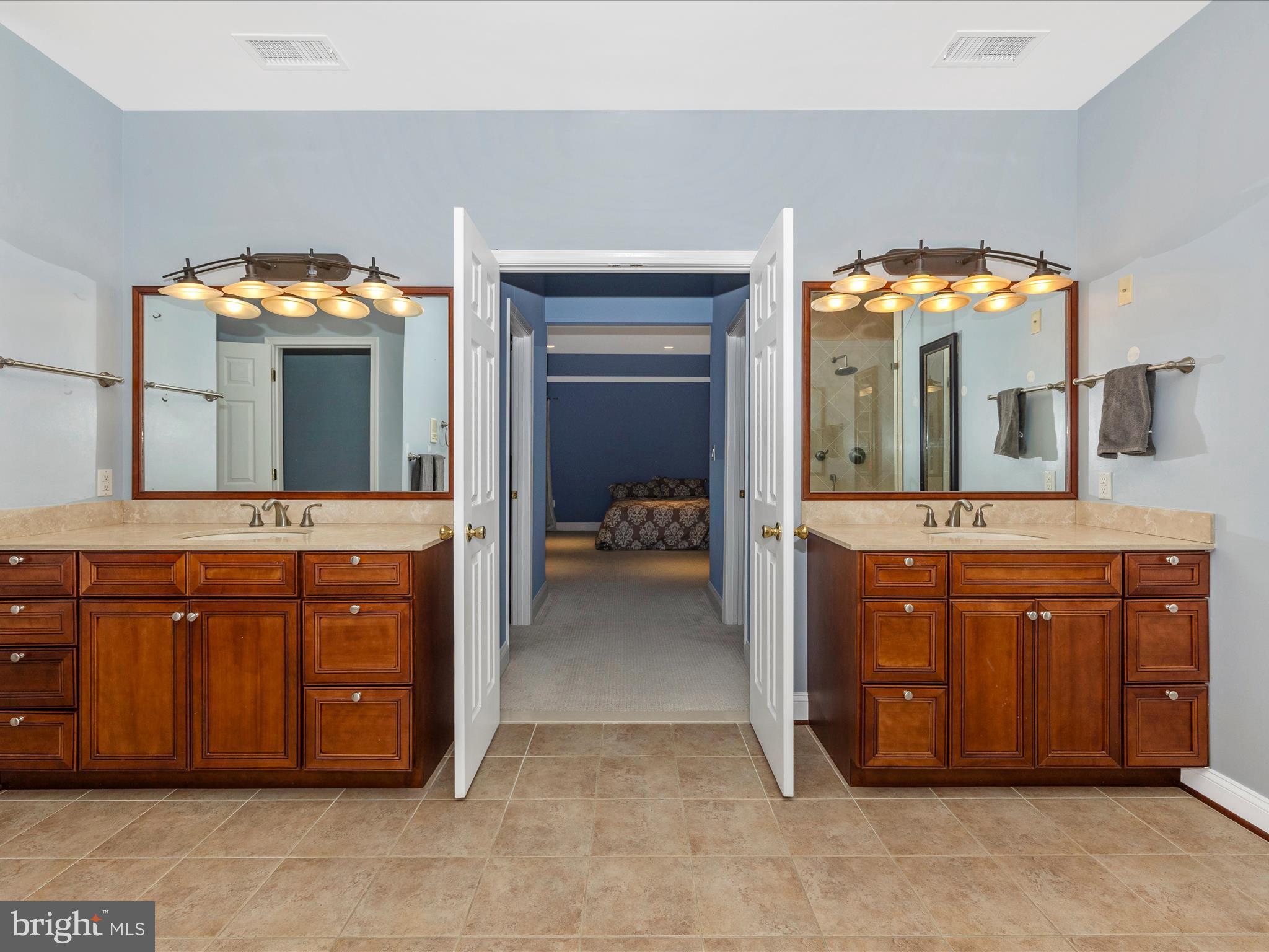 352 Ridge Road Washington Grove, MD 20880 - Photo 28 of 58 a spacious bathroom with a sink and a mirror