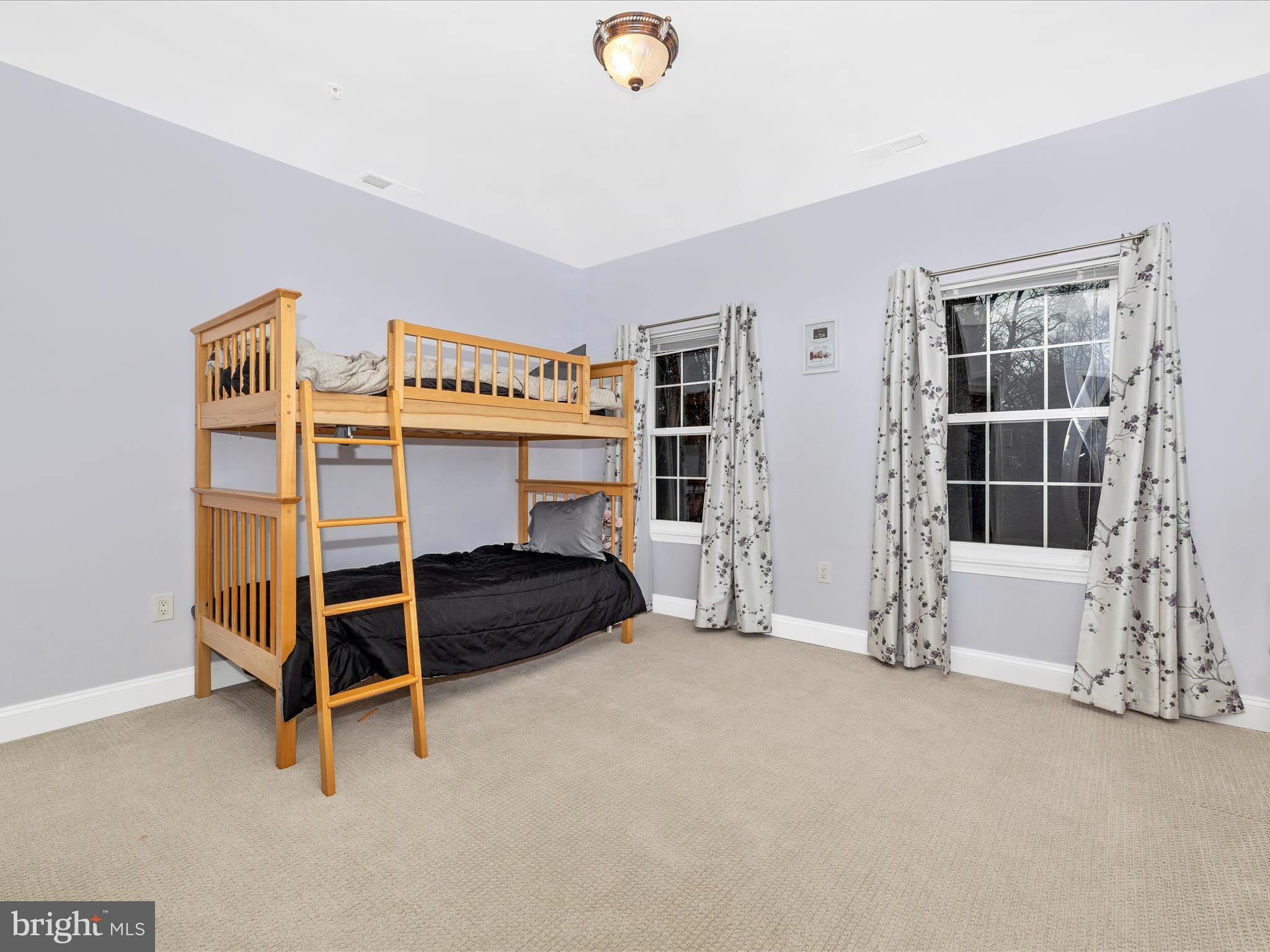 352 Ridge Road Washington Grove, MD 20880 - Photo 32 of 58 a bedroom with furniture and a window