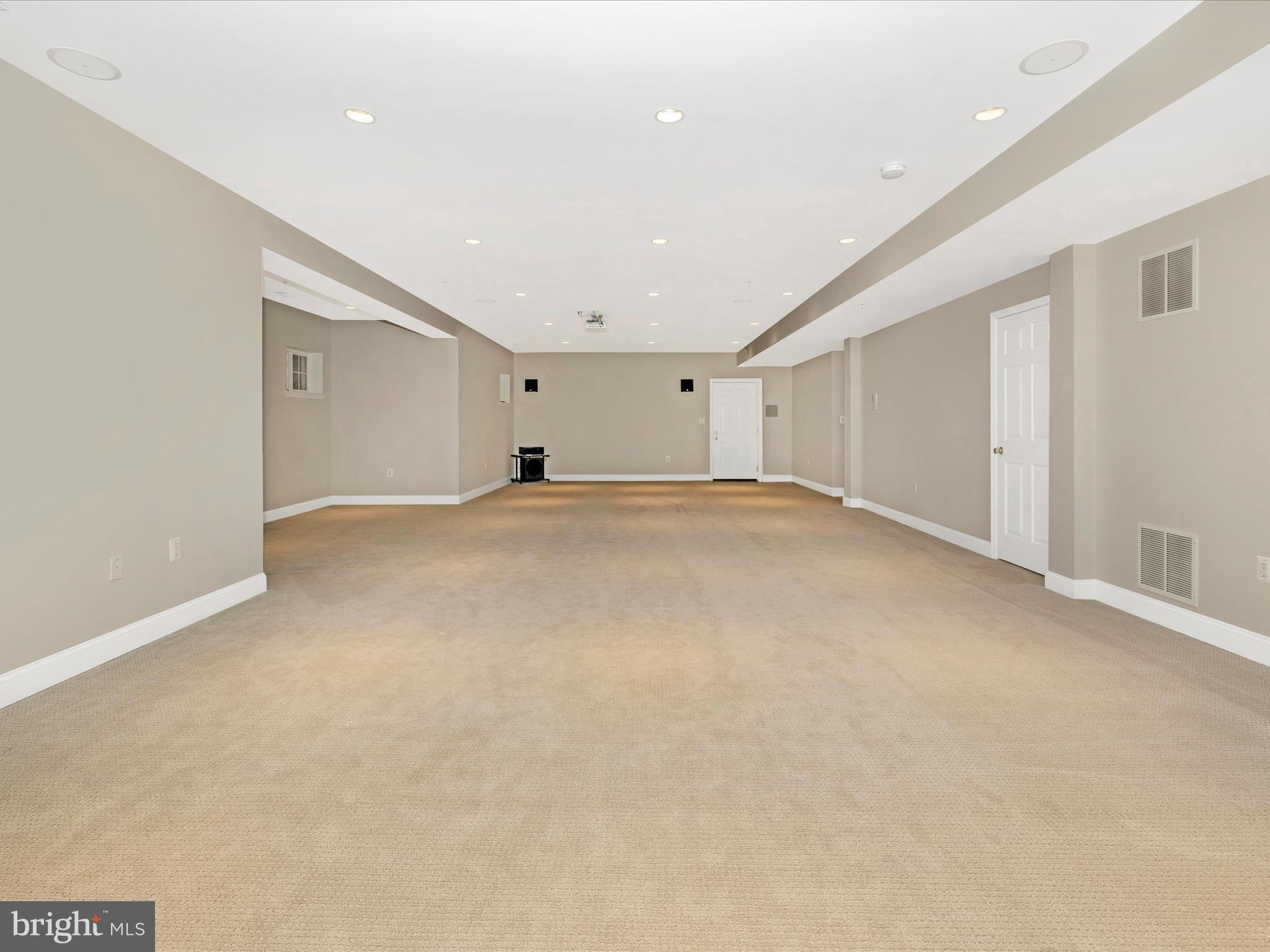 352 Ridge Road Washington Grove, MD 20880 - Photo 39 of 58 a view of an empty room with wooden floor