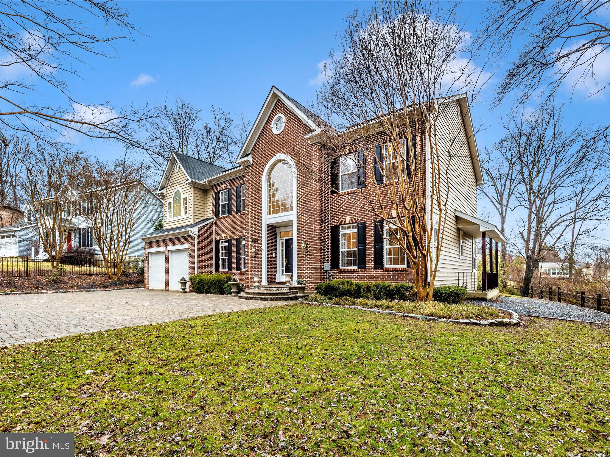 352 Ridge Road Washington Grove, MD 20880 - Photo 50 of 58 a front view of a house with a yard