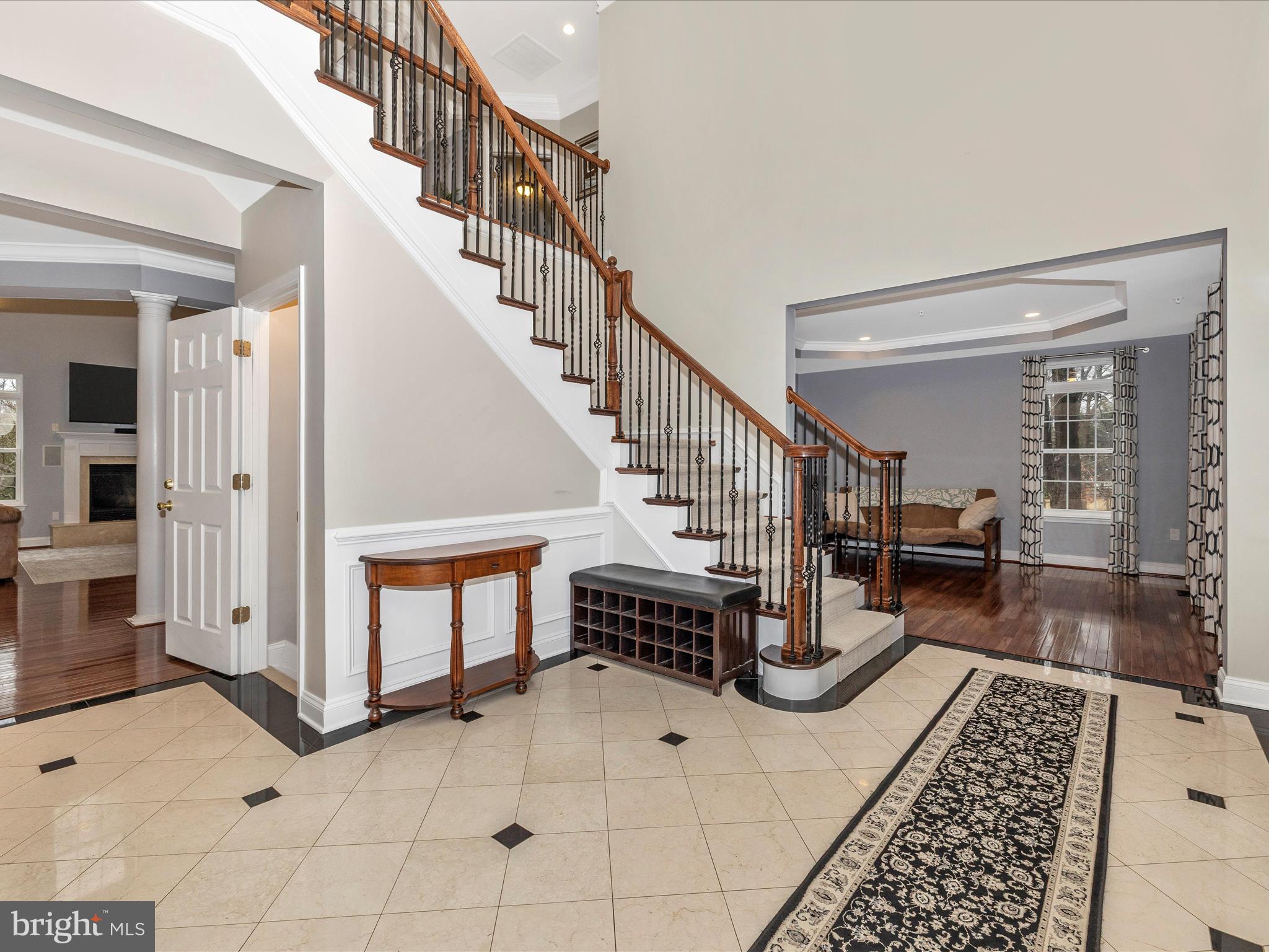 352 Ridge Road Washington Grove, MD 20880 - Photo 5 of 58 a living room with furniture and a rug