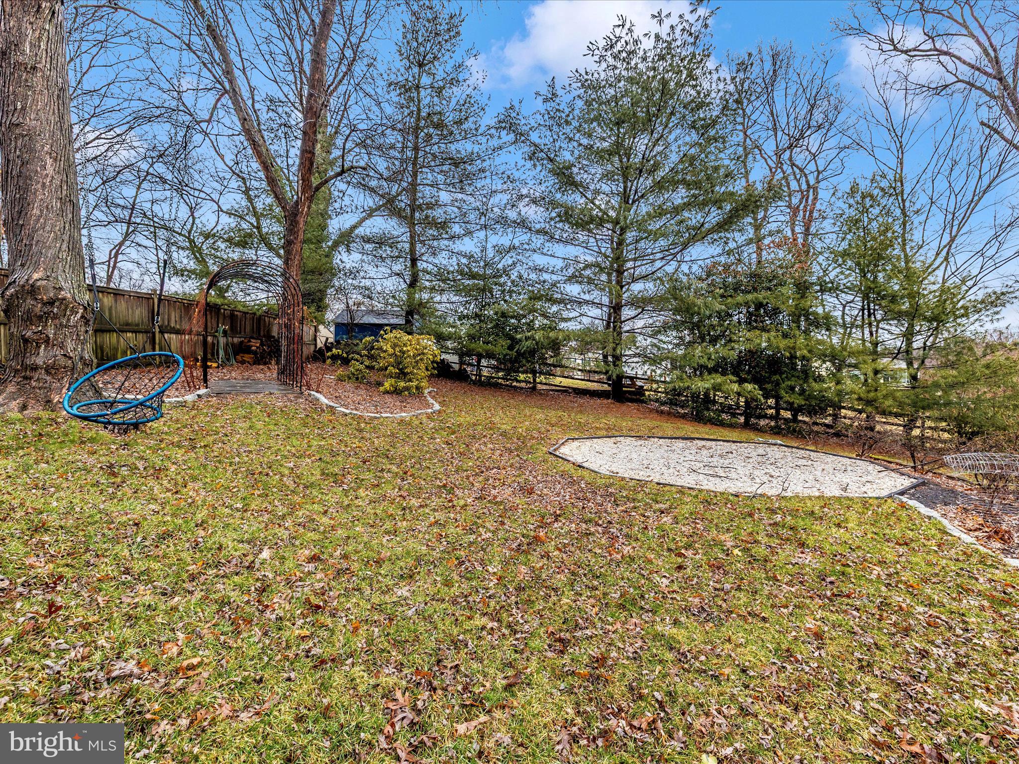 352 Ridge Road Washington Grove, MD 20880 - Photo 52 of 58 a view of a playground with basketball court