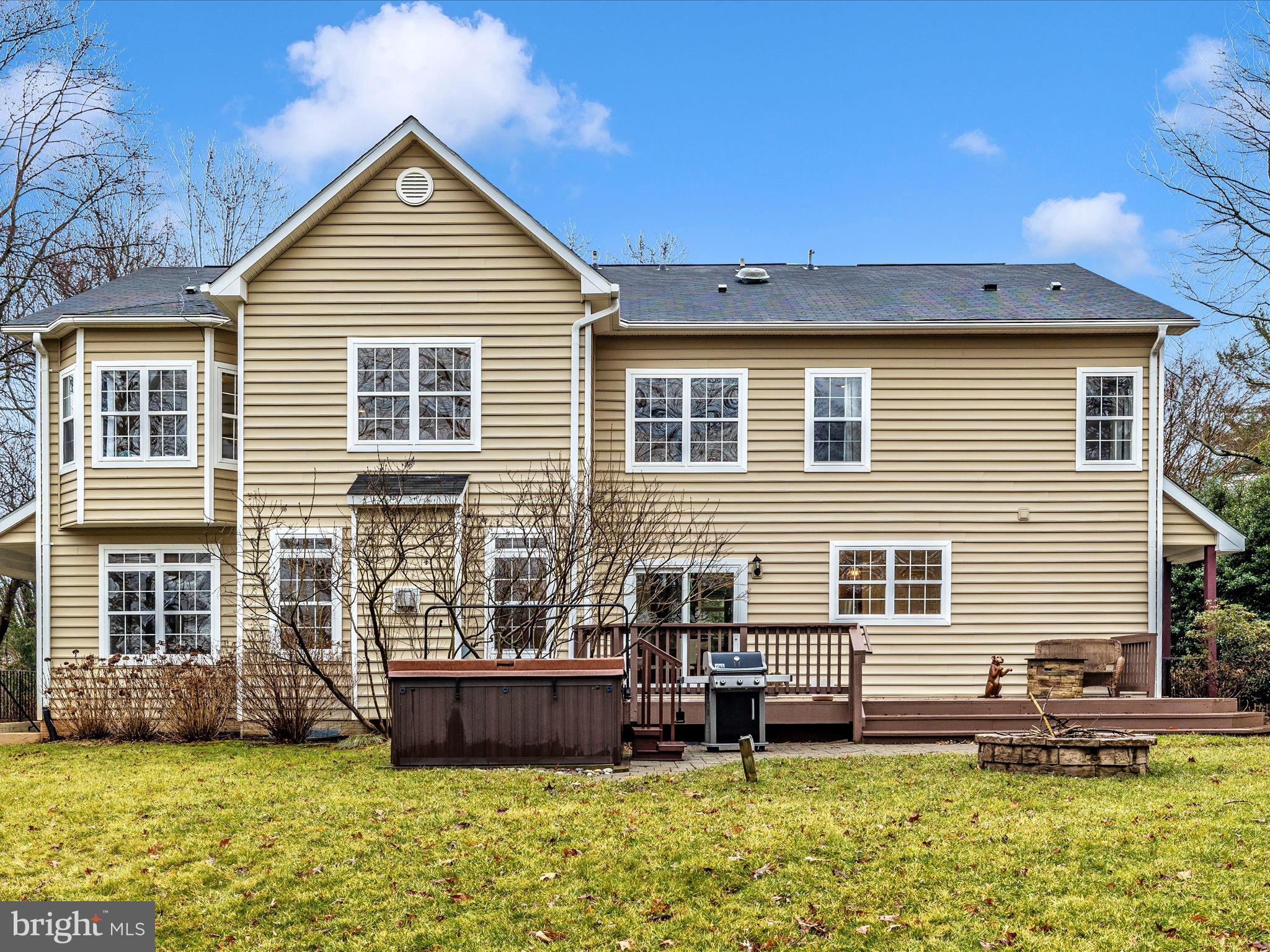 352 Ridge Road Washington Grove, MD 20880 - Photo 54 of 58 a front view of a house with a yard