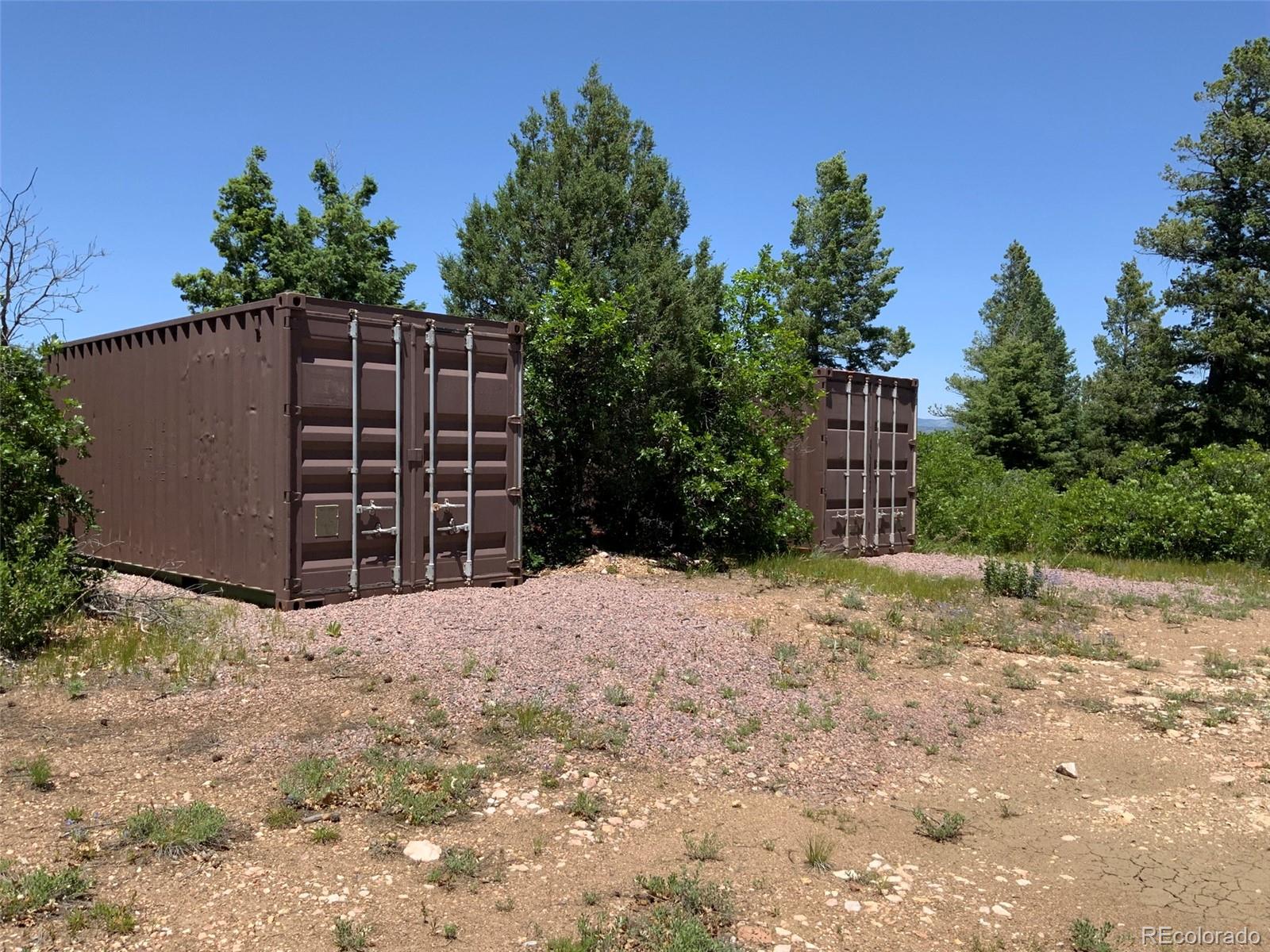 0 Peak View Ridge Canon City, CO 81212 - Photo 7 of 43 a wooden fence with trees in front of it